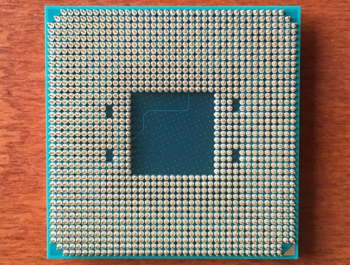 Media asset in full size related to 3dfxzone.it news item entitled as follows: Foto ravvicinate del nuovo socket AM4 di AMD e di una APU Bristol Ridge | Image Name: news24957_AMD-AM4_2.jpg